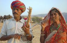 Indian folk musician couple at Pushkar Fair photograph by Raphael Shevelev